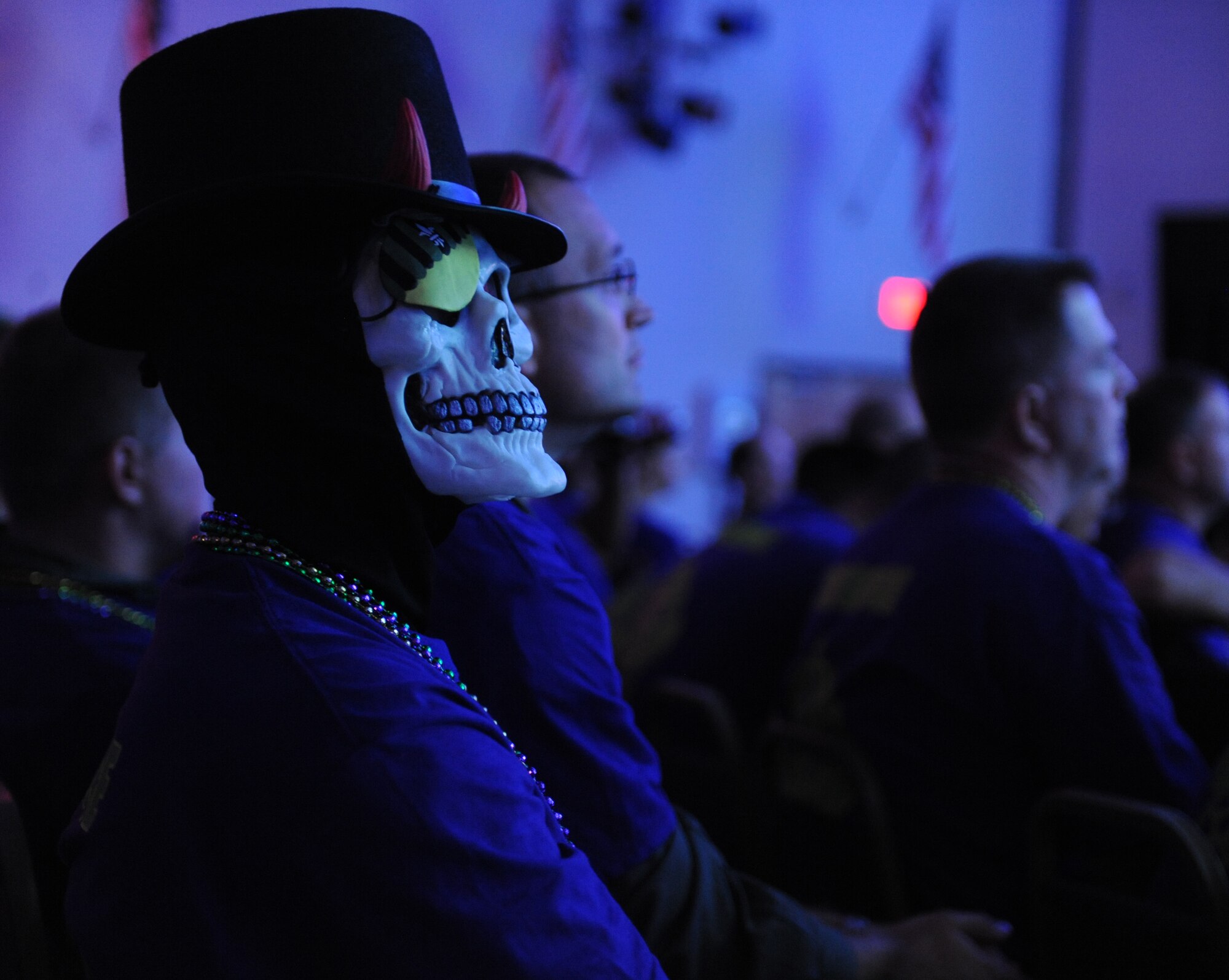 A costumed Team Barksdale Airman watches as the final scores are posted during the 2011 Global Strike Challenge on Barksdale Air Force Base, La., Nov. 9. Each year competing teams wear themed costumes and bring mascots to show off team esprit de corps. (U.S. Air Force photo/Airman 1st Class Micaiah Anthony)(RELEASED)  