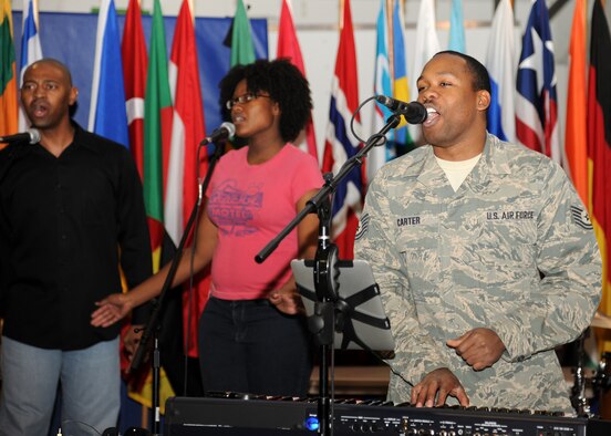U.S. Air Force Tech. Sgt. Robert Carter, Detachment 610 Air Force ROTC, sings “Without You” by David Guetta at the Multicultural World Showcase on Nov. 9 on Grand Forks Air Force Base, N.D.  Members of the Grand Forks military community gathered to celebrate their diversity with educational booths, dance and music demonstrations and food from around the world.  (U.S. Air Force photo by Airman 1st Class Ashley N. Taylor)