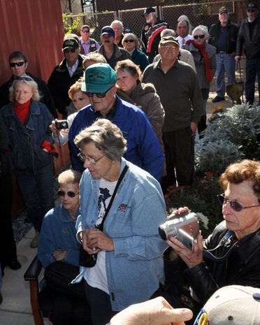 A crowd of active duty and retired military as well as local residents watch an unvieling ceremony at the Museum of the Forgotten Warrior outside of Beale Air Force Base, Calif., Nov. 10, 2011.  The museum  unveiled a memorial in honor of the servicemembers killed during the Iraq and Afghanistan Wars.  (U.S. Air Force photo by Staff Sgt. Jonathan Fowler)