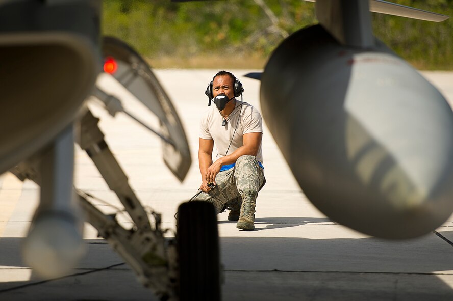 U.S. Air Force Staff Sgt. Jam Baro, crew chief, from the 46th Aircraft Maintenance Squadron, blue aircraft maintenance unit, Eglin Air Force Base, Fla., prepares a F-16 Fighting Falcon for a mission during exercise Vigilant Shield 12 on Naval Air Station Key West, Fla., Nov. 6, 2011. The exercise in Key West will be the "first-ever proof of concept" for the military's Joint Deployable Integrated Air and Missile Defense System, a collection of high-end radars and missile systems as well as aircraft that work in tandem in the event of a threat to the continental United States.  (U.S. Air Force photo by Tech. Sgt. Dennis J. Henry Jr.)