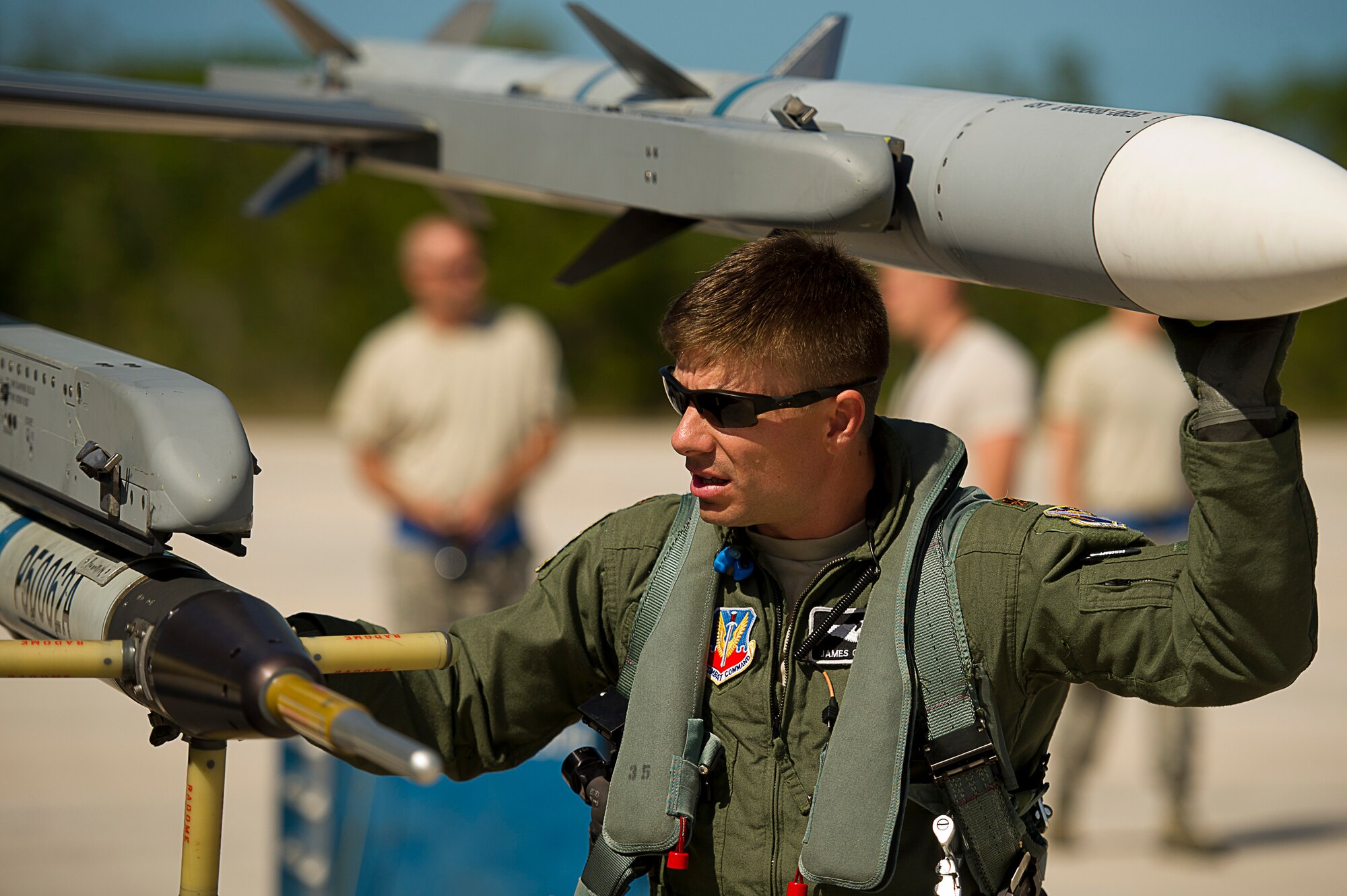 U.S. Air Force Maj. James Geoppinger  completes his preflight check of a F-16 Fighting Falcon for a mission during exercise Vigilant Shield 12 on Naval Air Station Key West, Fla., Nov. 6, 2011. The exercise in Key West will be the "first-ever proof of concept" for the military's Joint Deployable Integrated Air and Missile Defense System, a collection of high-end radars and missile systems as well as aircraft that work in tandem in the event of a threat to the continental United States.  (U.S. Air Force photo by Tech. Sgt. Dennis J. Henry Jr.)