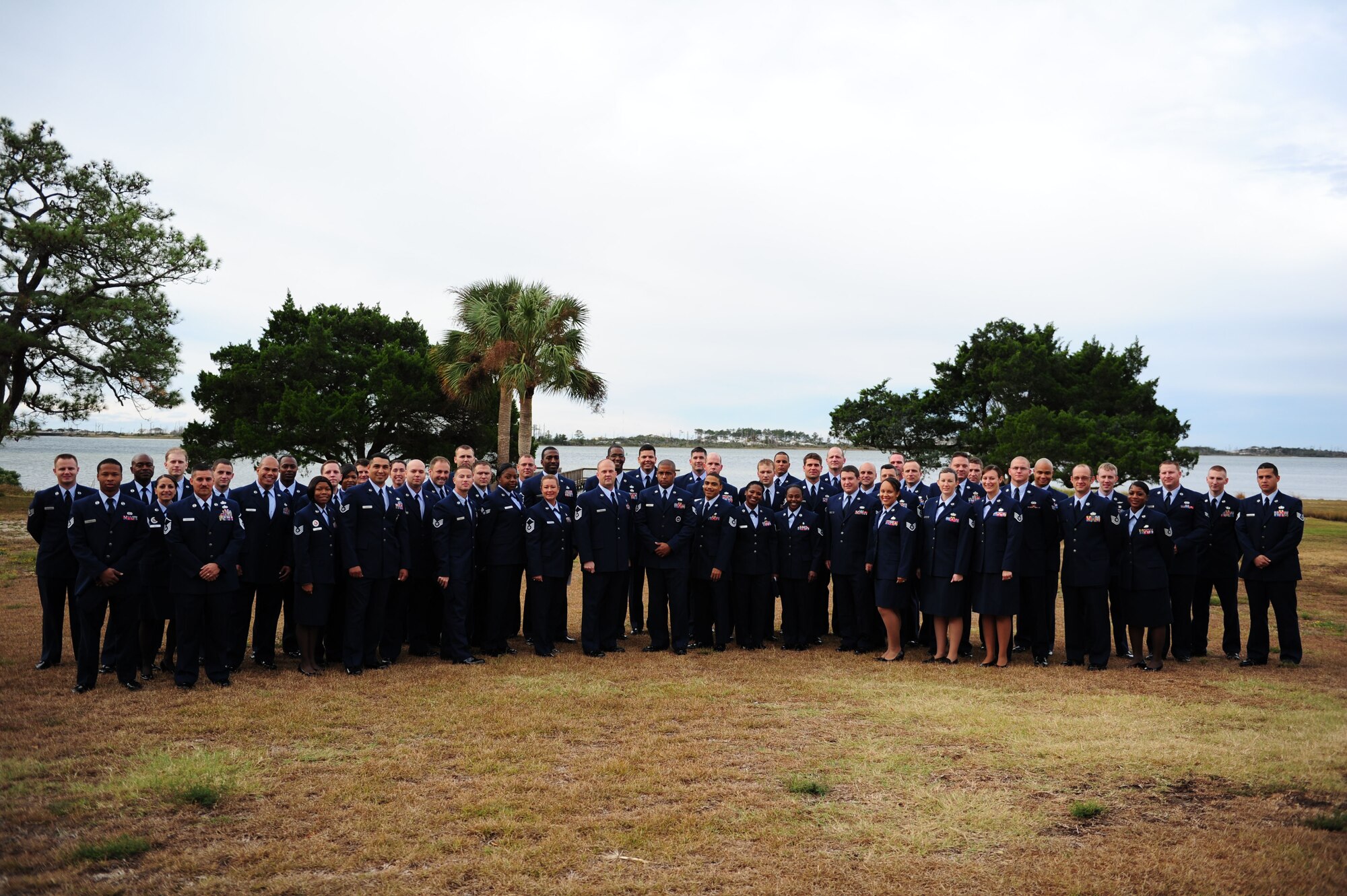 U.S. Air Force airmen pose for a group photo before a Community College of the Air Force graduation ceremony at the Soundside Club on Hurlburt Field Fla., Nov. 10.  This ceremony is held once a year to honor both spring and fall graduates. (U.S. Air Force photo/Airman 1st Class Gustavo Castillo) (Released)