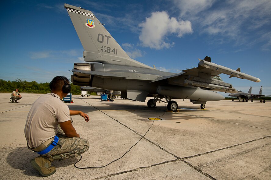 U.S. Air Force Staff Sgt. Jam Baro, crew chief, from the 46th Aircraft Maintenance Squadron, blue aircraft maintenance unit, Eglin Air Force Base, Fla., prepares a F-16 Fighting Falcon for a mission during exercise Vigilant Shield 12 on Naval Air Station Key West, Fla., Nov. 6, 2011. The exercise in Key West will be the "first-ever proof of concept" for the military's Joint Deployable Integrated Air and Missile Defense System, a collection of high-end radars and missile systems as well as aircraft that work in tandem in the event of a threat to the continental United States.  (U.S. Air Force photo by Tech. Sgt. Dennis J. Henry Jr.)