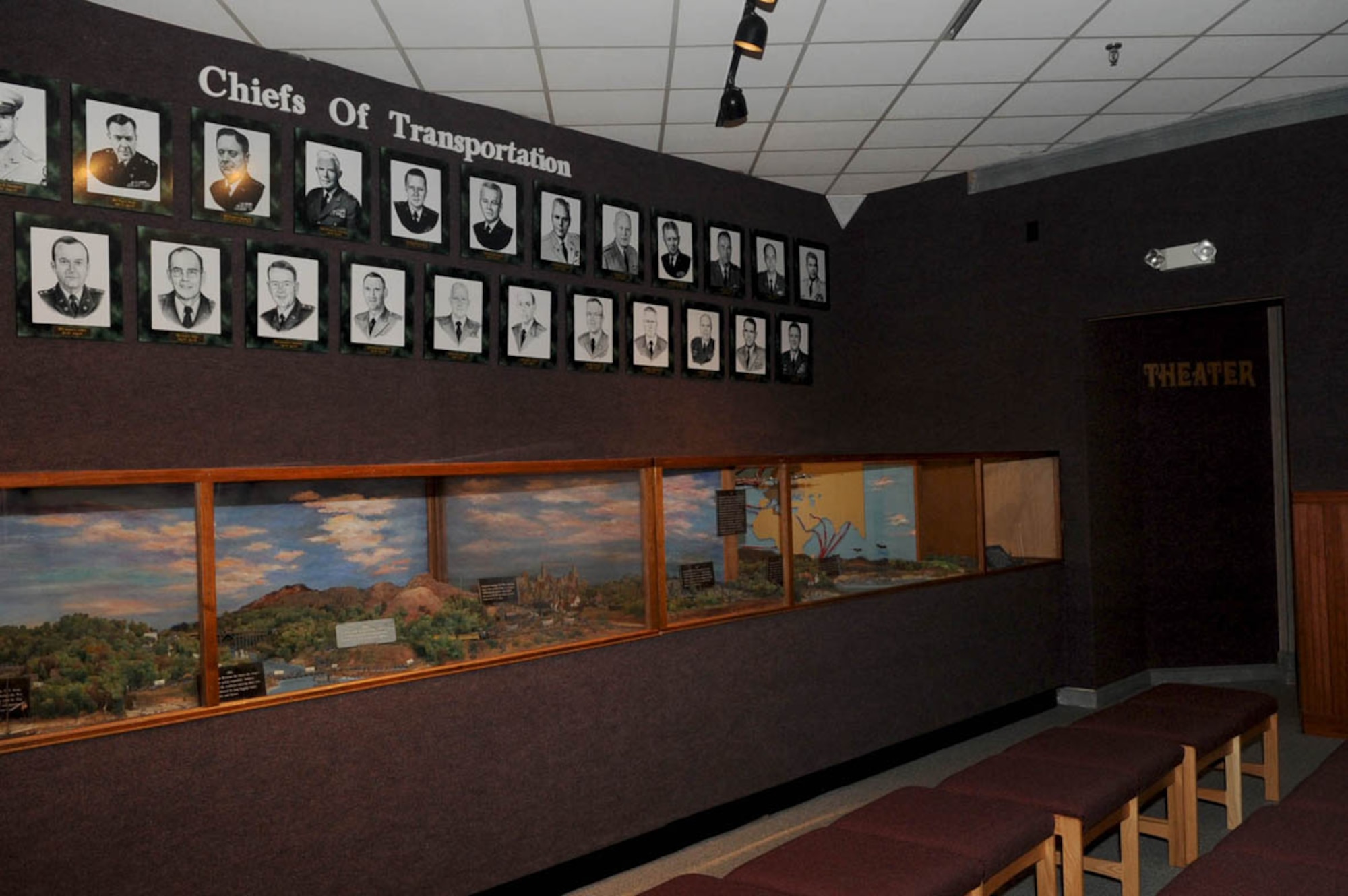A ‘Chiefs of Transportation’ hall of fame serves as the background to the theater of the U.S. Army Transportation Museum. (U.S. Air Force photo by Staff Sgt. Ashley Hawkins/Released)