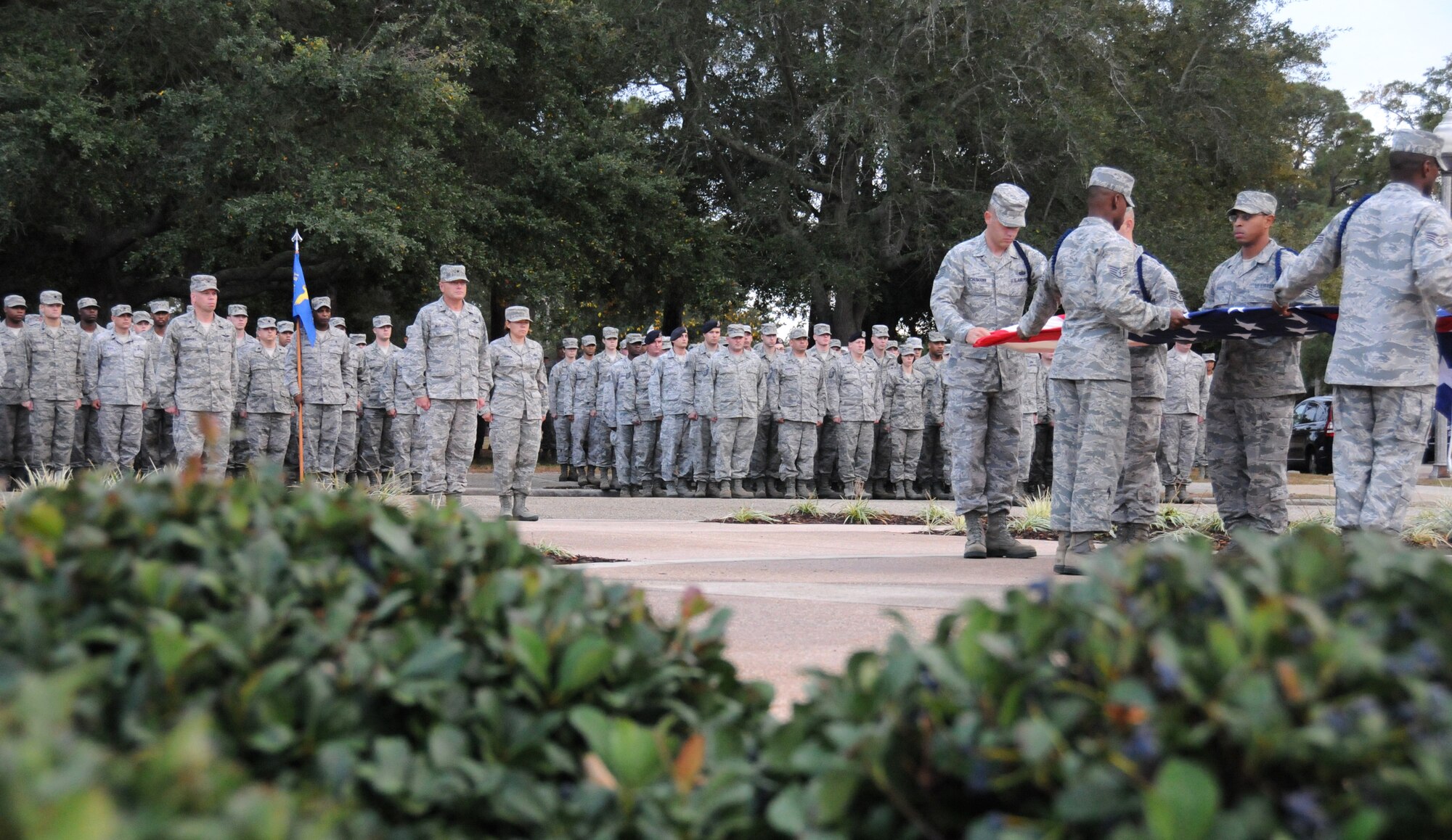 Members of the 81st Training Wing perform a retreat ceremony in front of the wing headquarters’ building at Keesler Air Force Base Nov. 9, 2011.  The retreat was performed in honor of Veteran’s Day.  (U.S. Air Force photo by Kemberly Groue)