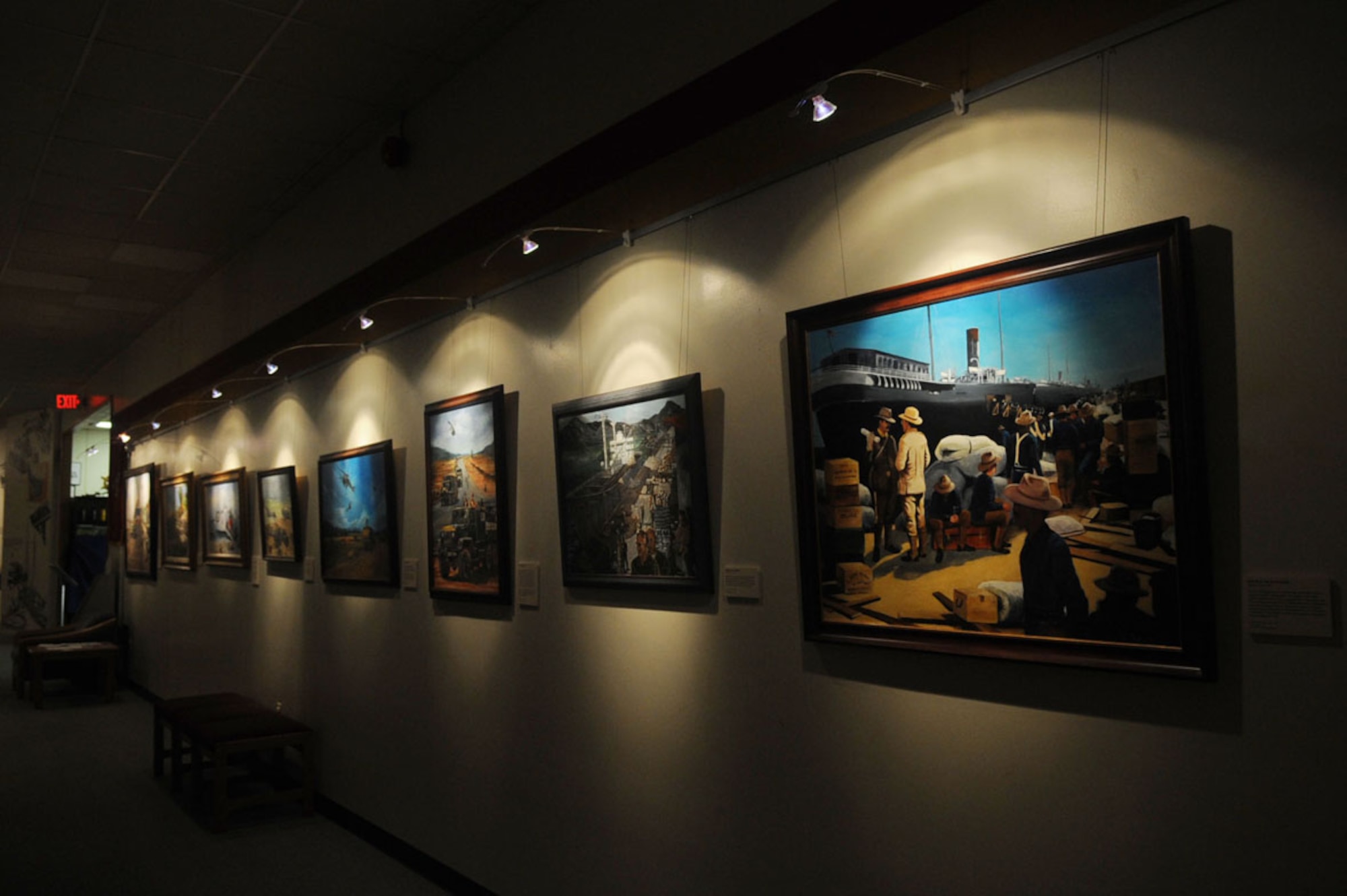 Displays of paintings depict the many types of cargo shipping the Army has employed throughout the decades. (U.S. Air Force photo by Staff Sgt. Ashley Hawkins/Released)