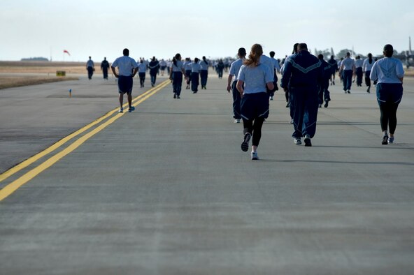 U.S. Air Force Airmen finish a 5 km base-wide run, Hurlburt Field, Fla., Nov. 7, 2011.  Air Commandos participated in this run to promote team work and unity with the host wing, 1st Special Operations Wing. (U.S. Air Force photo/Airman 1st Class Naomi Griego)(Released)