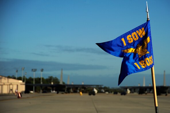 U.S. Air Force 1st Special Operations Support Squadron guide-on flag waves on the flightline, Hurlburt Field, Fla., Nov. 7, 2011.  The 1st SOSS participated in the run along with the other squadrons that comprise the 1st Special Operations Wing.  (U.S. Air Force photo/Airman 1st Class Naomi Griego)(Released)