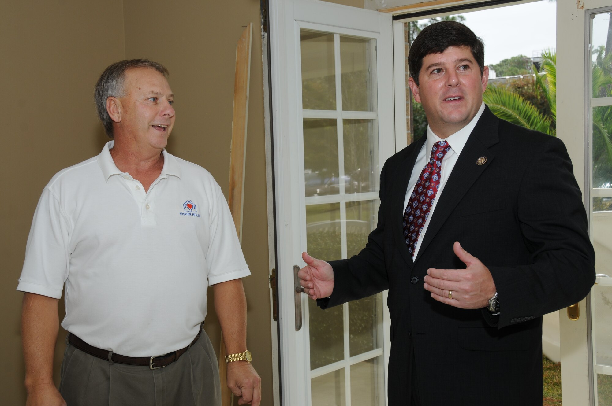 Larry Vetter, 81st Medical Group Fisher House director, gives Congressman Steve Palazzo of Mississippi, a tour of the Fisher House at Keesler Air Force Base, Miss., Nov. 8, 2011. The congressman also received a wing mission brief, a tour of the 403rd Wing and ate lunch with airmen during his visit at Keesler.  (U.S. Air Force photo by Kemberly Groue)