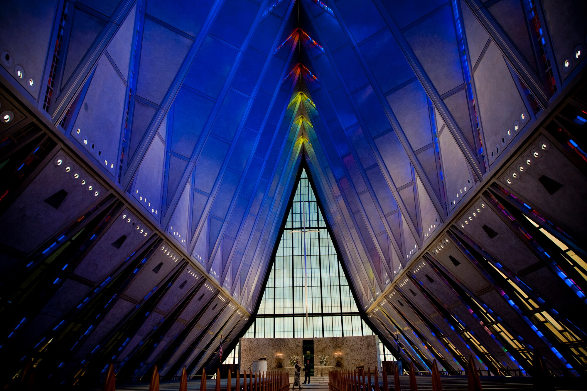 The inner hall of the academy Protestant chapel radiates different hues of light during a tour of the U.S. Air Force Academy, Colorado Springs, Colo., Nov. 4, 2011. The chapel was completed in 1962 and was designed to be like the rest of the academy and never go out of style. In 2004 as part of the Cadet Area it was named a National Historic Landmark.(U.S. Air Force Photo by Staff Sgt. Joshua J. Garcia/Released)
