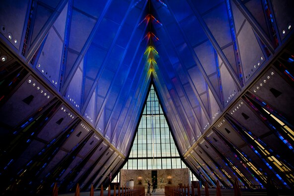 The inner hall of the academy Protestant chapel radiates different hues of light during a tour of the U.S. Air Force Academy, Colorado Springs, Colo., Nov. 4, 2011. The chapel was completed in 1962 and was designed to be like the rest of the academy and never go out of style. In 2004 as part of the Cadet Area it was named a National Historic Landmark.(U.S. Air Force Photo by Staff Sgt. Joshua J. Garcia/Released)