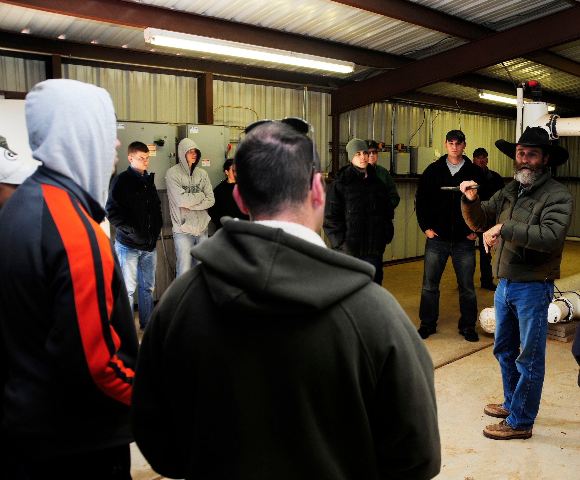 ALTUS AIR FORCE BASE, Okla. – Tom Buchanan, Lugert-Altus Irrigation District manager, explains the function of a water filtration system to service members assigned to Altus AFB Nov. 9, 2011. The system removes debris from the water which then goes through a second filtering process to remove bacteria. After the water is cleaned it is sent to local farms during the dry season to help grow crops. (U.S. Air Force photo by Airman 1st Class Franklin Ramos / 97th Air Mobility Wing Public Affairs / Released) 
 
