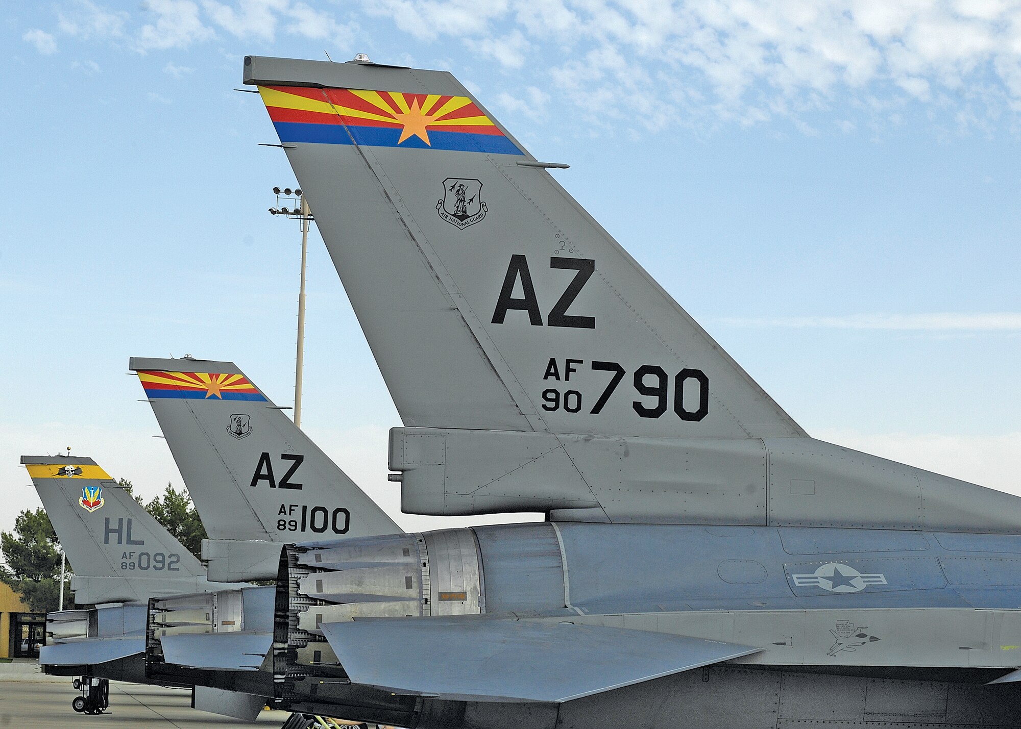 F-16 Fighting Falcons from the Arizona Air National Guard and Hill Air Force Base, Utah, sit on the runway after having flown in the 2nd Annual Fighter Country Fly-in Nov. 4 at Luke Air Force Base, Ariz. More than 150 pilots, active and retired, participated in the event.