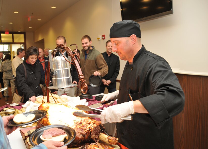 Chef Richard Nest carve roast beef during the ribbon cutting ceremony of The Heritage Center at Niagara November 9, 2011 Niagara Falls Air Reserve Station, NY. The Heritage Center at Niagara is the newest facility to open at the Niagara Falls base. (U.S. Air Force photo by Staff Sgt. Joseph McKee)