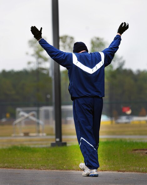 U.S. Air Force Tech. Sgt. William Ohrt, 20th Component Maintenance Squadron munitions mobility supervisor, finishes the 5K Combined Federal Campaign run, Shaw Air Force Base, S.C., Nov. 10, 2011.This year is "50 years of caring" for the CFC. CFC is an annual drive which is based on one idea for one gift, once a year. Its purpose is to "improve quality of local community, nation, and world," President John F. Kennedy 1961. This year's goal is to reach $175,000. (U.S. Air Force photo by Airman 1st Class Tabatha Duarte/Released)