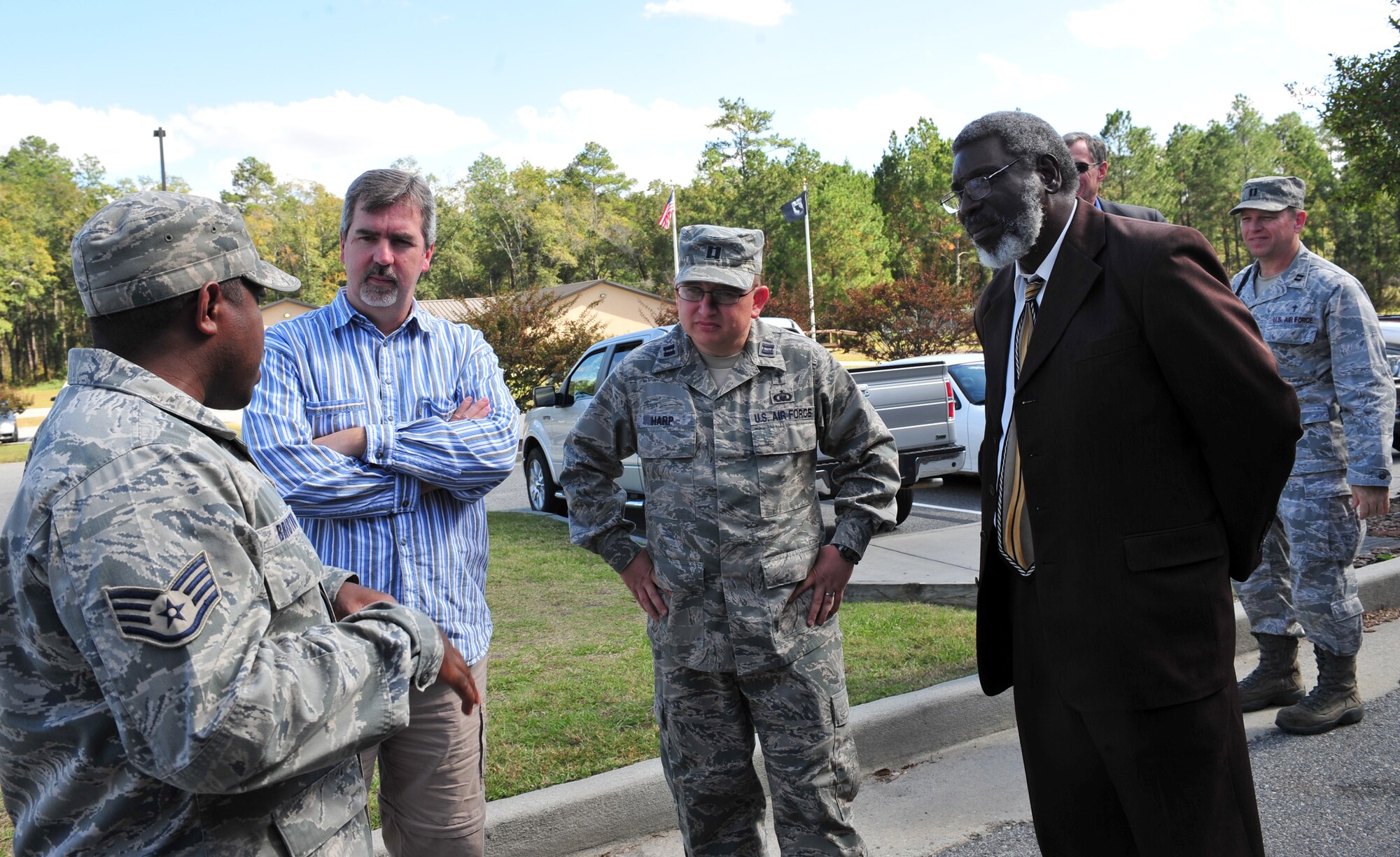 Local clergy members and U.S Air Force Capt. Erik Harp, 93d Air Ground Operations Wing chaplain, center, speak to Staff Sgt. David Bristow, 820th Combat Operations Squadron assistant NCO in charge of armor, about his job during a local clergy members visit to Moody Air Force Base, Ga., Nov. 3, 2011. This was the first time the clergy member’s visited Moody, but the chaplains hope to make this an annual event. (U.S. Air Force photo by Staff Sgt. Stephanie Mancha/Released)
