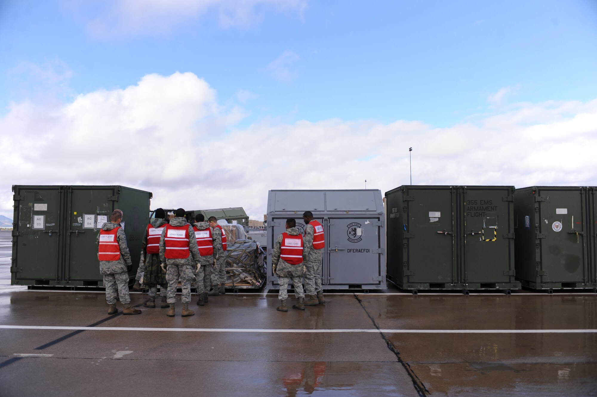 U.S. Air Force Airmen from the 355th Fighter Wing await further instructions during the operational readiness exercise on Davis-Monthan Air Force Base, Ariz., Nov. 7, 2011. (U.S. Air Force photo by Airman 1st Class Christine Griffiths/Released)