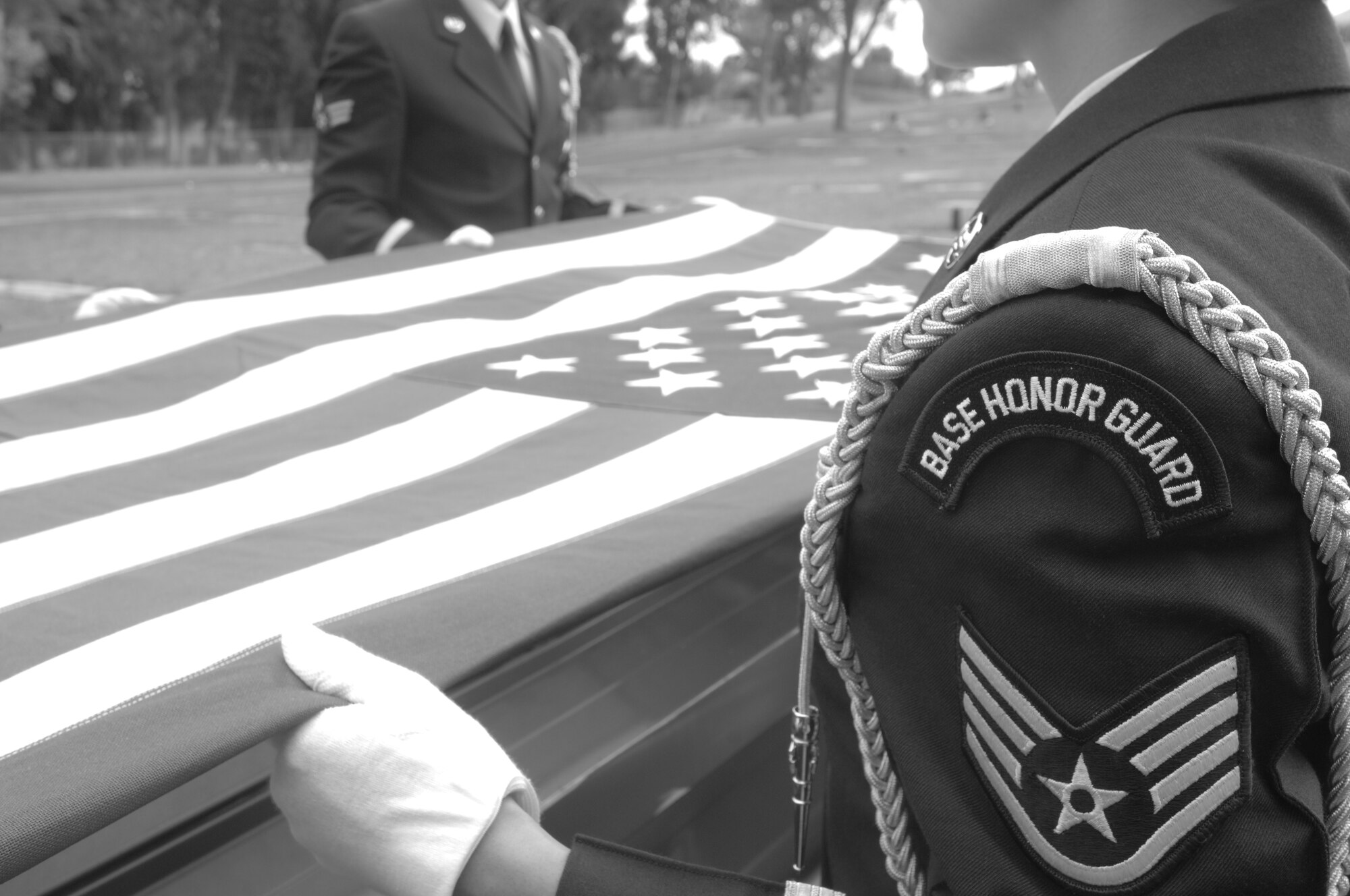 VANDENBERG AIR FORCE BASE, Calif.-- Members of the base honor guard prepare to fold the American flag during a funeral practice at the Lompoc Evergreen Cemetery here Tuesday, Sept. 20, 2011. It is the United States Air Force’s privilege and responsibility to render military honors for veterans and active duty service members at their interment. (U.S. Air Force photo/Senior Airman Lael Huss)
