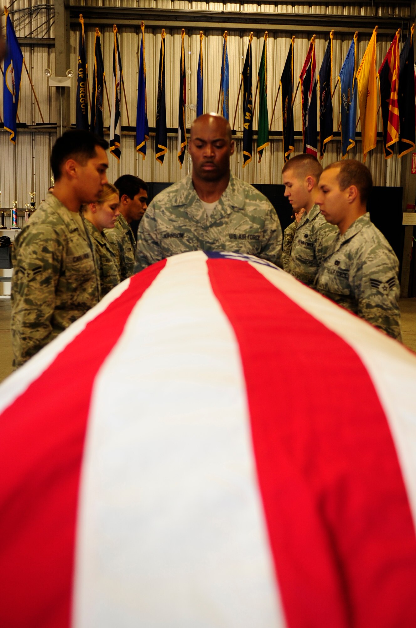 VANDENBERG AIR FORCE BASE, Calif.-- Members of the base honor guard practice a funeral sequence during a training day at the honor guard building here Tuesday, Aug. 2, 2011. The base honor guard consists of 48 members who are all volunteers. (U.S. Air Force photo/Senior Airman Lael Huss)
