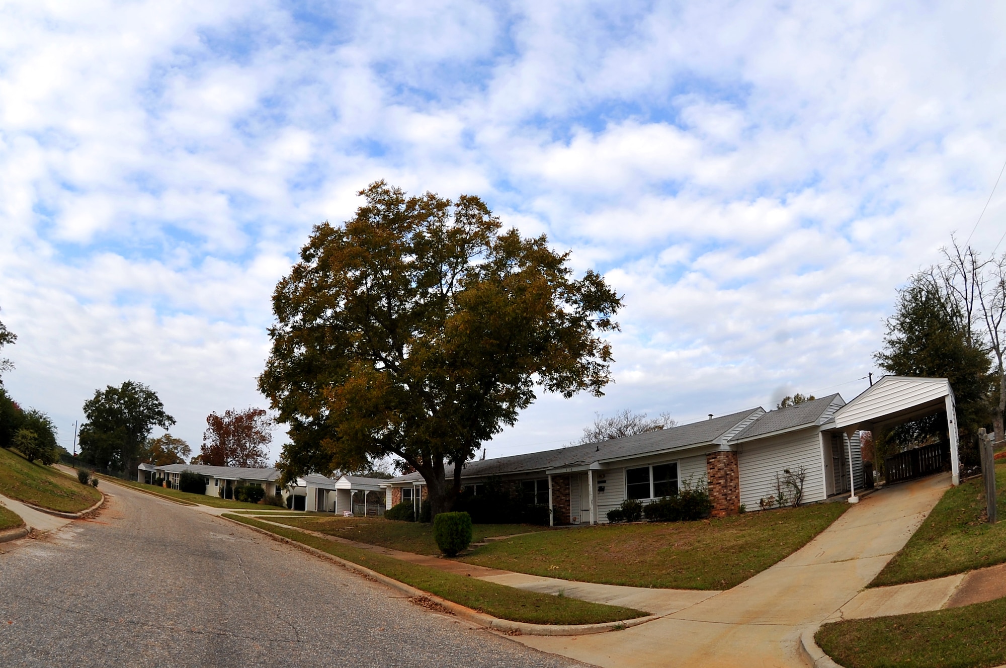 Condemned houses on Shaw's White Oak street sit vacant prior to being demolished, Nov. 10, 2011, Shaw Air Force Base, S.C. House 583 will be amongst the first houses to be demolished on Nov. 14, 2011, during a family housing redevelopment commencement ceremony signifying the beginning of a family housing privatization redevelopment project. (U.S. Air Force photo by Senior Airman Kenny Holston/Released)



