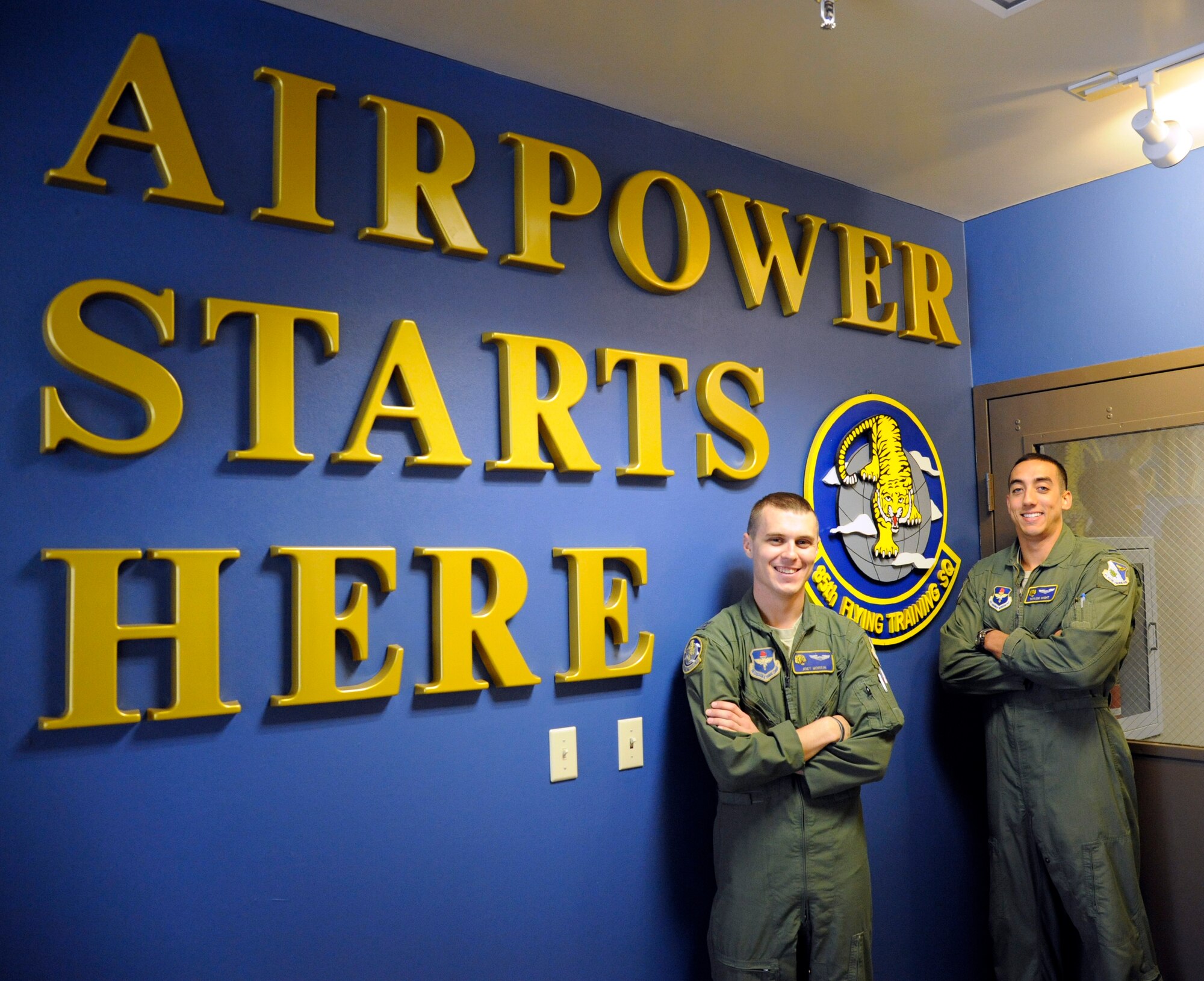 LAUGHLIN AIR FORCE BASE, Texas -- Captain Joseph Morrin, 85th Flying Training Squadron assistant flight commander and 1st Lt. Taylor Wight, 85th FTS instructor here, are the winners of the T-6 Texan II category of the Low-Level Competition held at Randolph Air Force Base Nov. 4. Working as a team they completed the flight course while flying at 500 feet and without the aid of flight planning software. (U.S. Air Force photo/Airman 1st Class Nathan L. Maysonet)