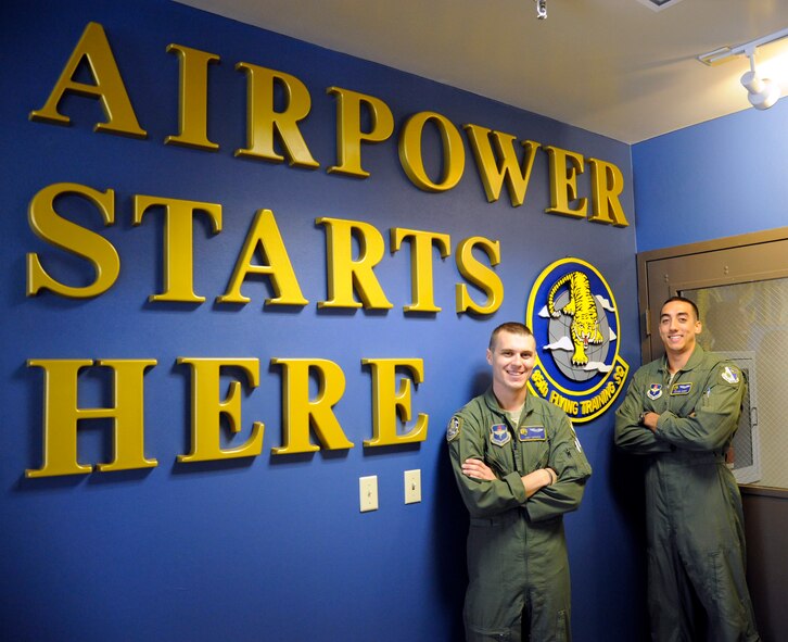 LAUGHLIN AIR FORCE BASE, Texas -- Captain Joseph Morrin, 85th Flying Training Squadron assistant flight commander and 1st Lt. Taylor Wight, 85th FTS instructor here, are the winners of the T-6 Texan II category of the Low-Level Competition held at Randolph Air Force Base Nov. 4. Working as a team they completed the flight course while flying at 500 feet and without the aid of flight planning software. (U.S. Air Force photo/Airman 1st Class Nathan L. Maysonet)