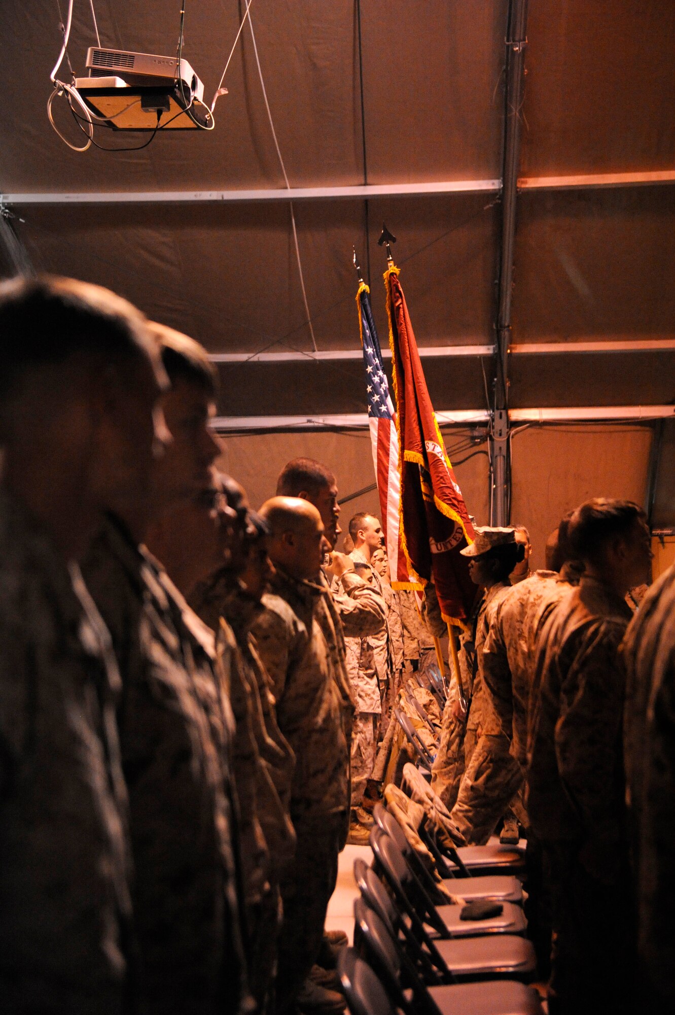 A Marine Corps Color Guard retires the colors ending a ceremony celebrating the Corps’ 236th birthday at the Transit Center at Manas, Kyrgyzstan, Nov. 10. The event was attended by several Marines passing through the Transit Center on their way to and home from Afghanistan. (U.S. Air Force photo/Tech. Sgt. Tammie Moore)