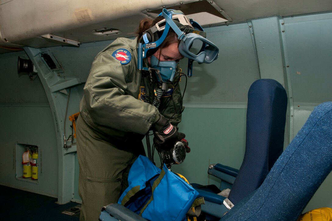 Senior Airman Jodie Sites performs a pre-flight inspection on a C-5 Galaxy aircraft on November 5, 2011, at the 167th Airlift Wing, Martinsburg, WV.  In addition to being a loadmaster at the unit, Sites is also an elementary school teacher and she is taking graduate classes to earn her Master’s degree. (National Guard photo by Staff Sergeant Michael Dickson)