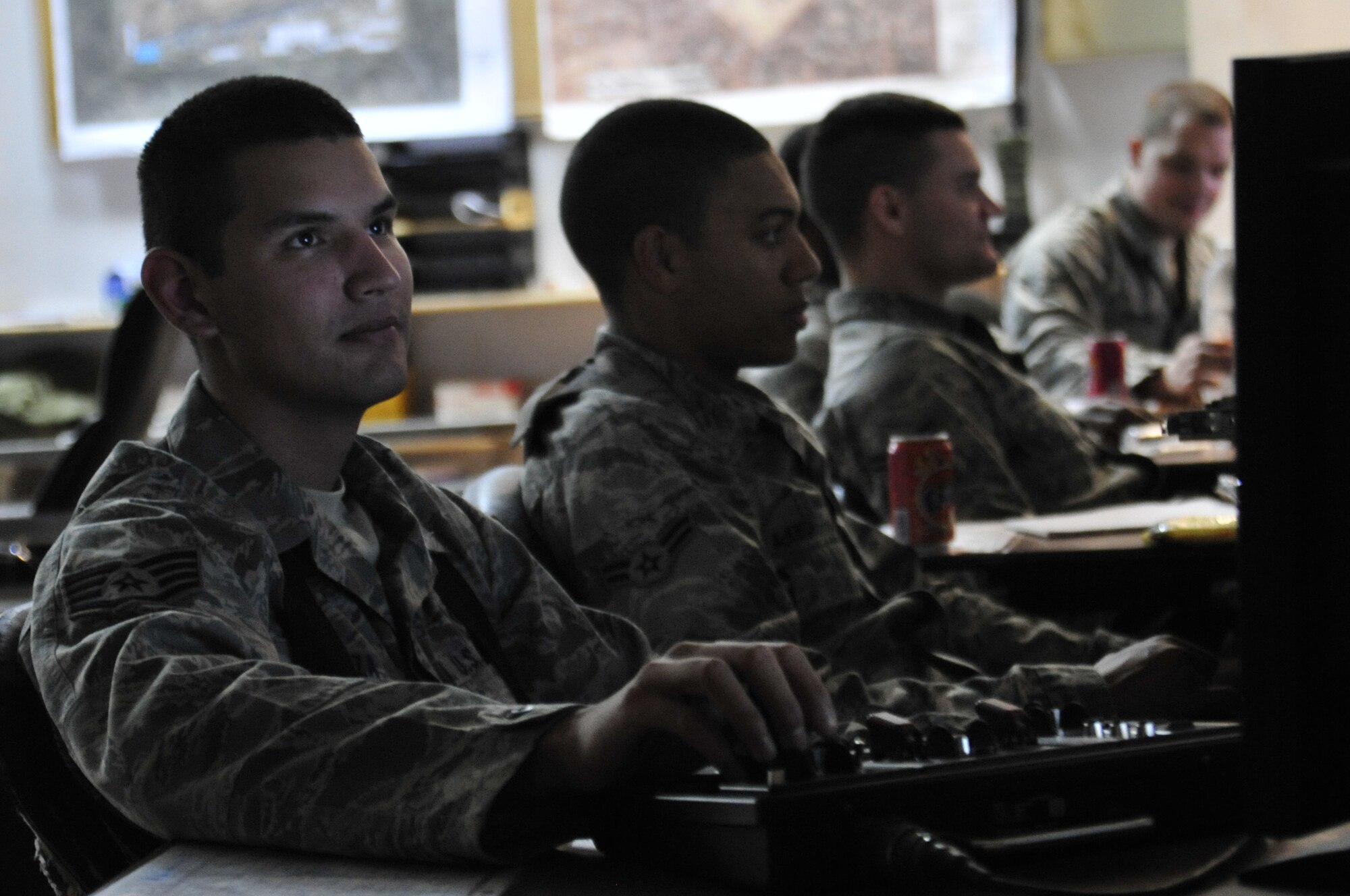 Staff Sgt. Alfredo Garza, 332nd Expeditionary Security Forces Squadron member, watches perimeter security monitors at Joint Base Balad, Iraq, Oct. 15, 2011. Garza is deployed from Aviano Air Base, Italy, and is from San Juan, Texas. JB Balad has disassembled units, turned in equipment, and shut down services to transition the base to the Iraqi government. (U.S. Air Force photo/Master Sgt. Cecilio Ricardo)
