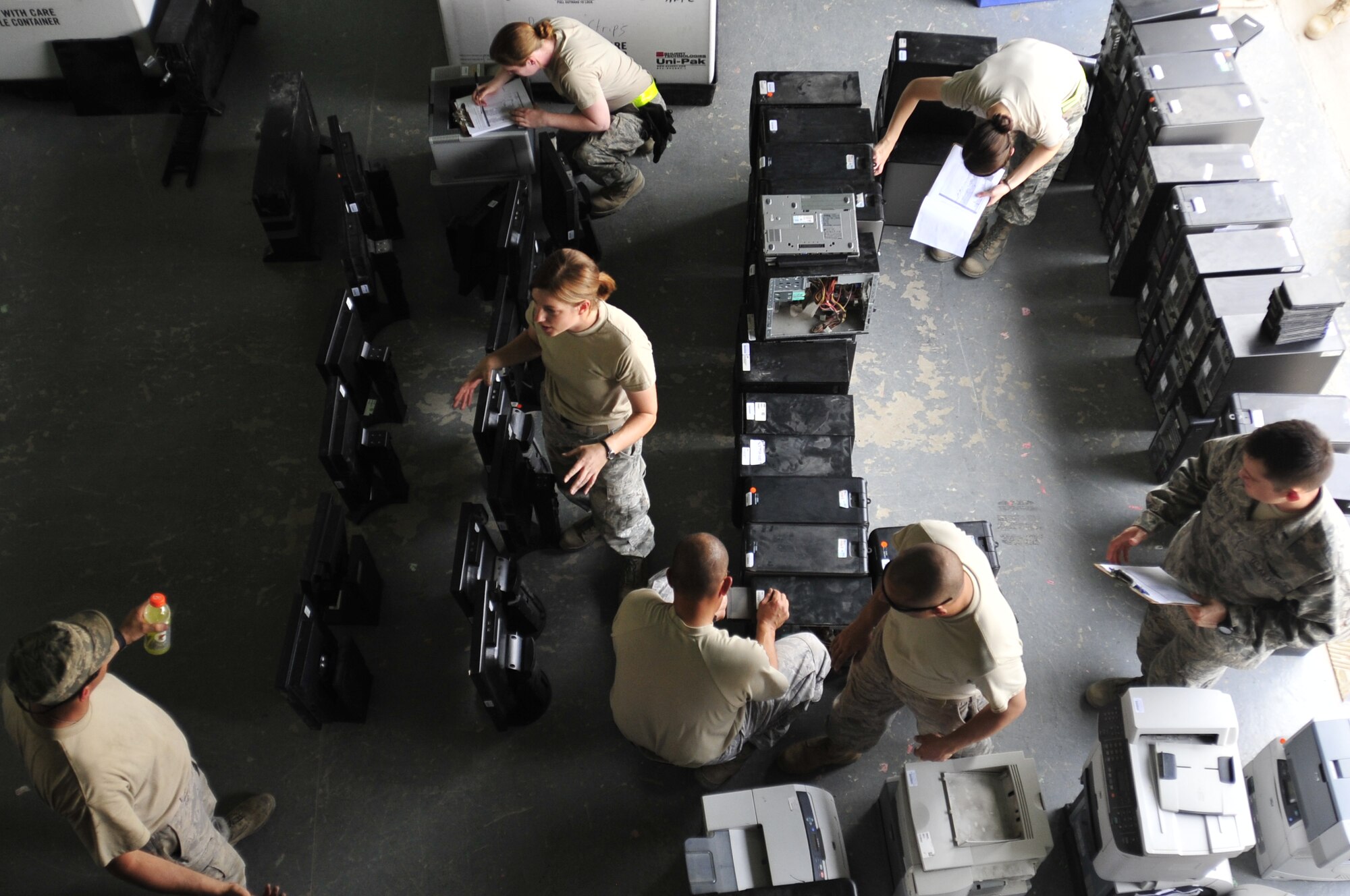 Airmen of the 332nd Air Expeditionary Wing organize and take inventory of all turned-in computer hardware at Joint Base Balad, Iraq, Oct. 15, 2011. More than 12,000 pieces of equipment were turned in during the final days of operation at JB Balad. JB Balad has disassembled units, turned in equipment, and shut down services to transition the base to the Iraqi government. (U.S. Air Force photo/Master Sgt. Cecilio Ricardo)