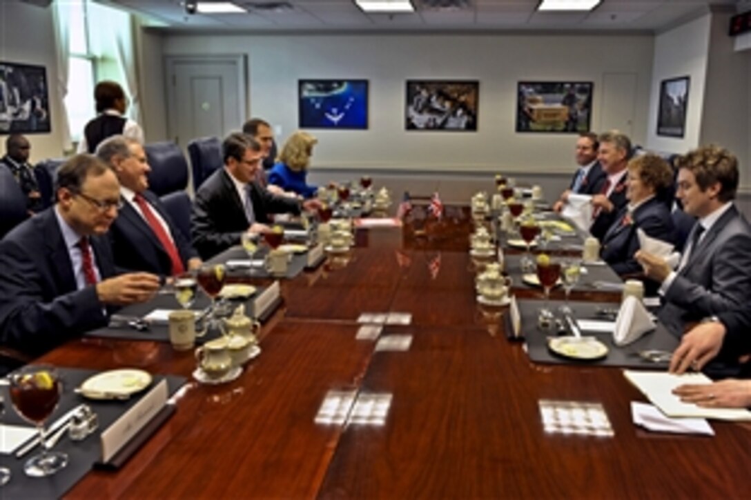 Deputy Defense Secretary Ashton B. Carter, center left, hosts a working lunch with the United Kingdom's Permanent Under Secretary of Defense Ursula Brennan, center right, at the Pentagon, Nov. 10, 2011.  Both principals were joined by a selection of their senior advisors as they discussed a variety of defense-related issues.