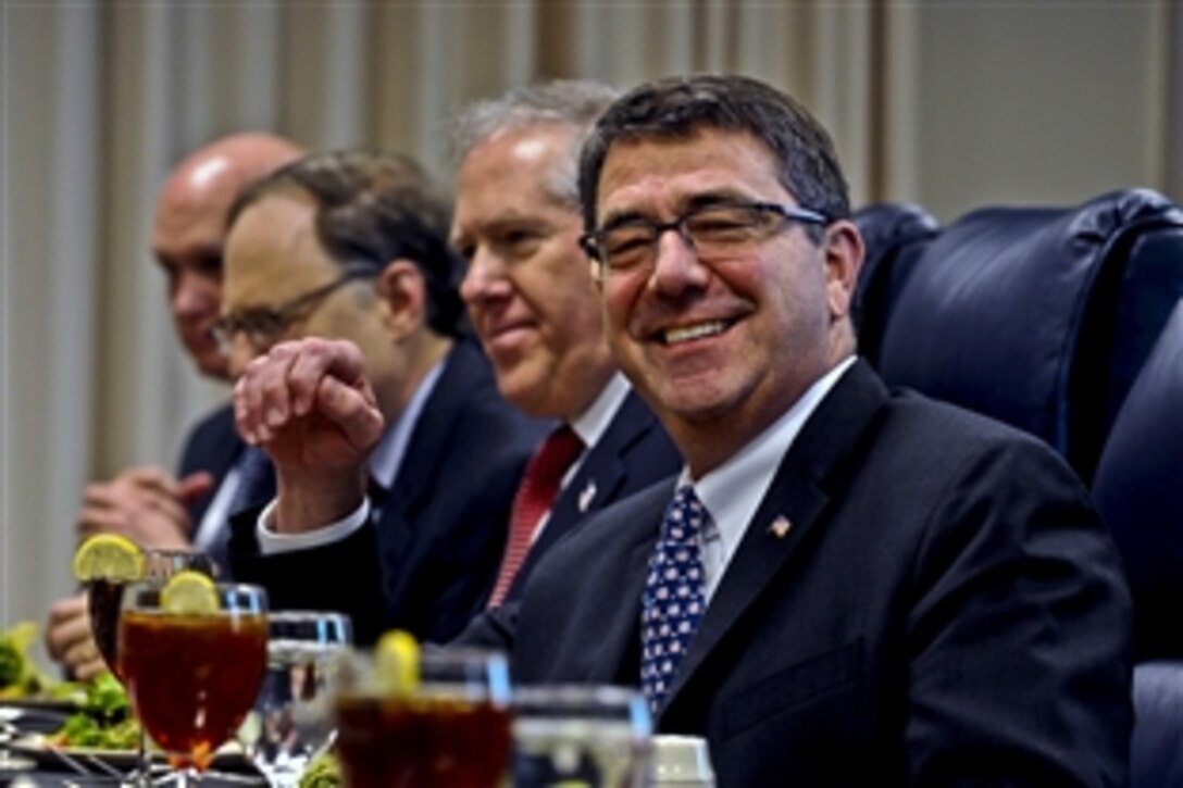Deputy Defense Secretary Ashton B. Carter smiles during a working lunch at the Pentagon, Nov. 10, 2011. 