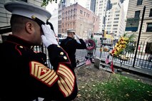 NEW YORK -- Lt. Col. Richard J. Bordonaro, Instructor Inspector, 6th Communications Battalion, Marine Forces Reserve, and Sgt. Maj. George S. Sanchez salutes the grave site of the third Commandant of the United States Marine Corps, Franklin Wharton, Nov. 10. The Marines of 6th Communications Battalion placed a wreath at his headstone overlooking the busy streets of New York. Wharton served from 1798 to 1818. He was the first Commandant to occupy the Commandant's House, Marine Barracks, Washington. He was born in Philadelphia, and now rests at Trinity Church a few blocks away from Wall Street in Manhattan. (Marine Corps production by Sgt. Randall A. Clinton / RELEASED)