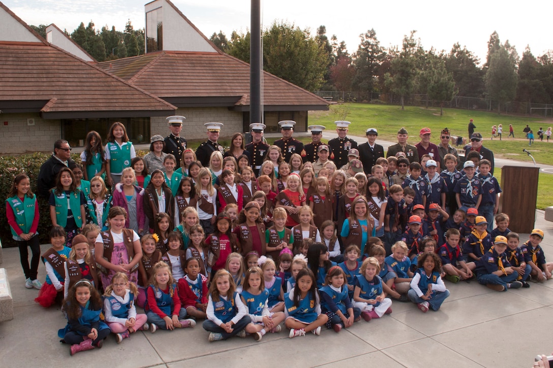 The staff and students of Aviara Oaks Elementary School honored veterans from all branches of the military today.  Veterans were invited to attend a welcome reception, hosted by local cub scouts and girls scouts in the school auditorium. Immediately following the reception, the veterans were escorted to the school's flagpole where the 15th Marine Expeditionary Unit conducted a flag raising ceremony and a reading of the poem, "Old Glory".  The students sang the national anthem and all in attendance recognized our local veterans for their service and sacrifice to our country.  (U.S. Marine Corps photo by Gunnery Sgt. Jennifer M. Antoine)