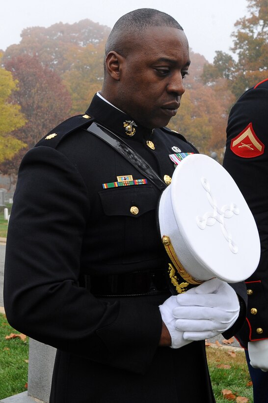 Maj. Jeramy Green, executive officer of Marine Corps Institute Company at Marine Barracks Washington, pauses for a moment of silence to pay respects to Maj. Gen. William P. Biddle, 11th commandant of the Marine Corps, during a wreath-laying ceremony at Arlington National Cemetery Nov. 10. Six teams from the Barracks visited various graves of former commandants and sergeants major of the Marine Corps in the National Capital Region to honor those former leaders of the Corps on the Marine Corps birthday.