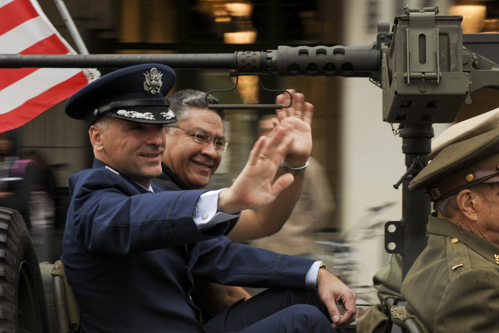 VANDENBERG AIR FORCE BASE, Calif. – Col. Richard Boltz, 30th Space Wing commander, and Salud Carbajal, Santa Barbara County first district supervisor, wave to pedestrians during the Veterans Day Parade on State Street in Santa Barbara Friday, Nov. 11, 2011. First proclaimed on Nov. 11, 1919, as Armistice Day to celebrate the signing of the Armistice that ended World War I, it was expanded in 1954 to include veterans of all wars and has been known as Veterans Day ever since. (U.S. Air Force photo/Staff Sgt. Levi Riendeau)