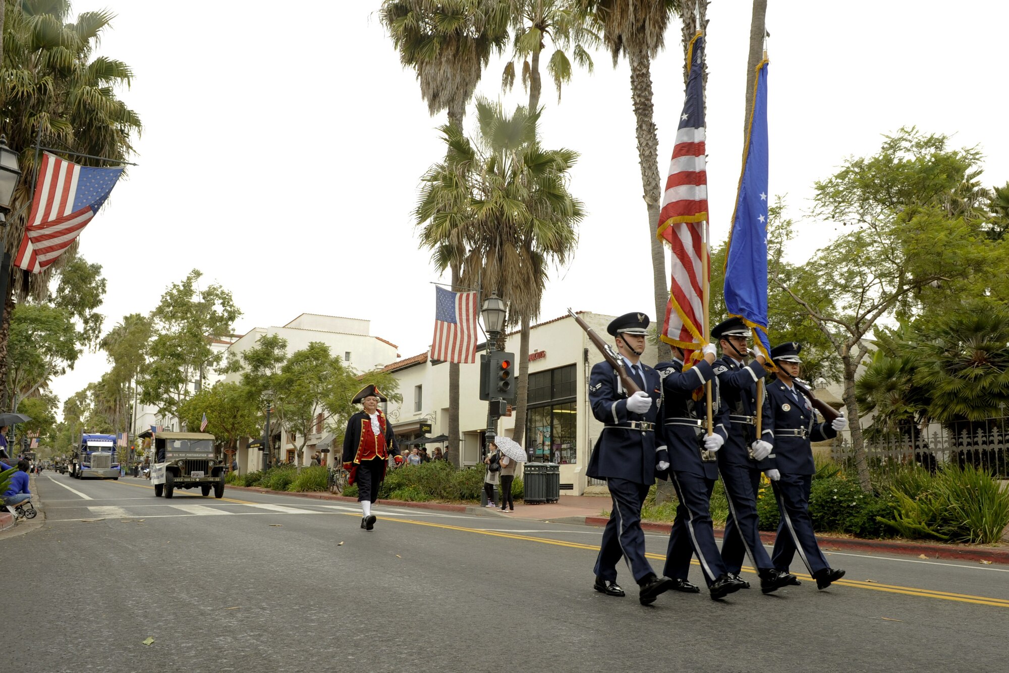 VANDENBERG AIR FORCE BASE, Calif. – The Vandenberg Honor Guard marches during the Veterans Day Parade on State Street in Santa Barbara Friday, Nov. 11, 2011. First proclaimed on Nov. 11, 1919, as Armistice Day to celebrate thesigning of the Armistice that ended World War I, it was expanded in 1954 to include veterans of all wars and has been known as Veterans Day ever since. (U.S. Air Force photo/Staff Sgt. Levi Riendeau)
