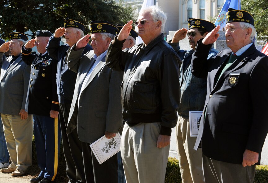 Veterans salute during the National Anthem at the Veterans Day Ceremony at the Sumter County Courthouse, S.C., Nov. 11, 2011. The Sumter County Veterans Association joined with Team Shaw and the Sumter community to remember those who have given so much in the defense of American freedoms and ideals. Veterans Day is held annually to celebrate patriotism and the love for our country. (U.S. Air Force photo by Airman 1st Class Tabatha Duarte/Released)