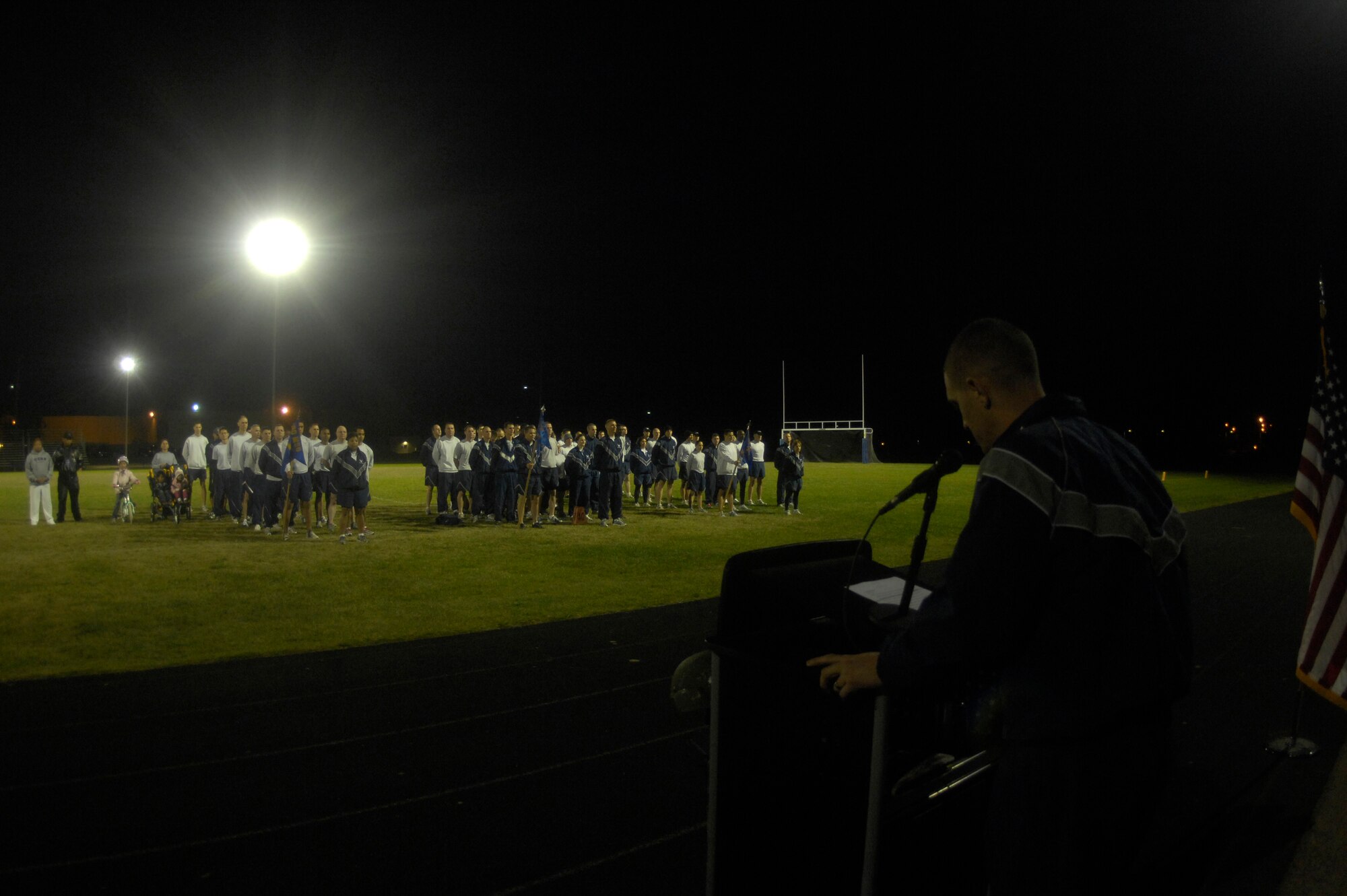 VANDENBERG AIR FORCE BASE, Calif. -- Members of the 30th Space Wing stand in formation for the Run to Remember closing ceremony at the base track Friday, Nov. 11, 2011. A Run to Remember began Oct. 20, and more than 12,000 miles were run by Team V members in honor of the 6,249 military members who lost their lives in support of Operations Iraqi Freedom, Enduring Freedom and New Dawn. (U.S. Air Force photo/Senior Airman Lael Huss)
