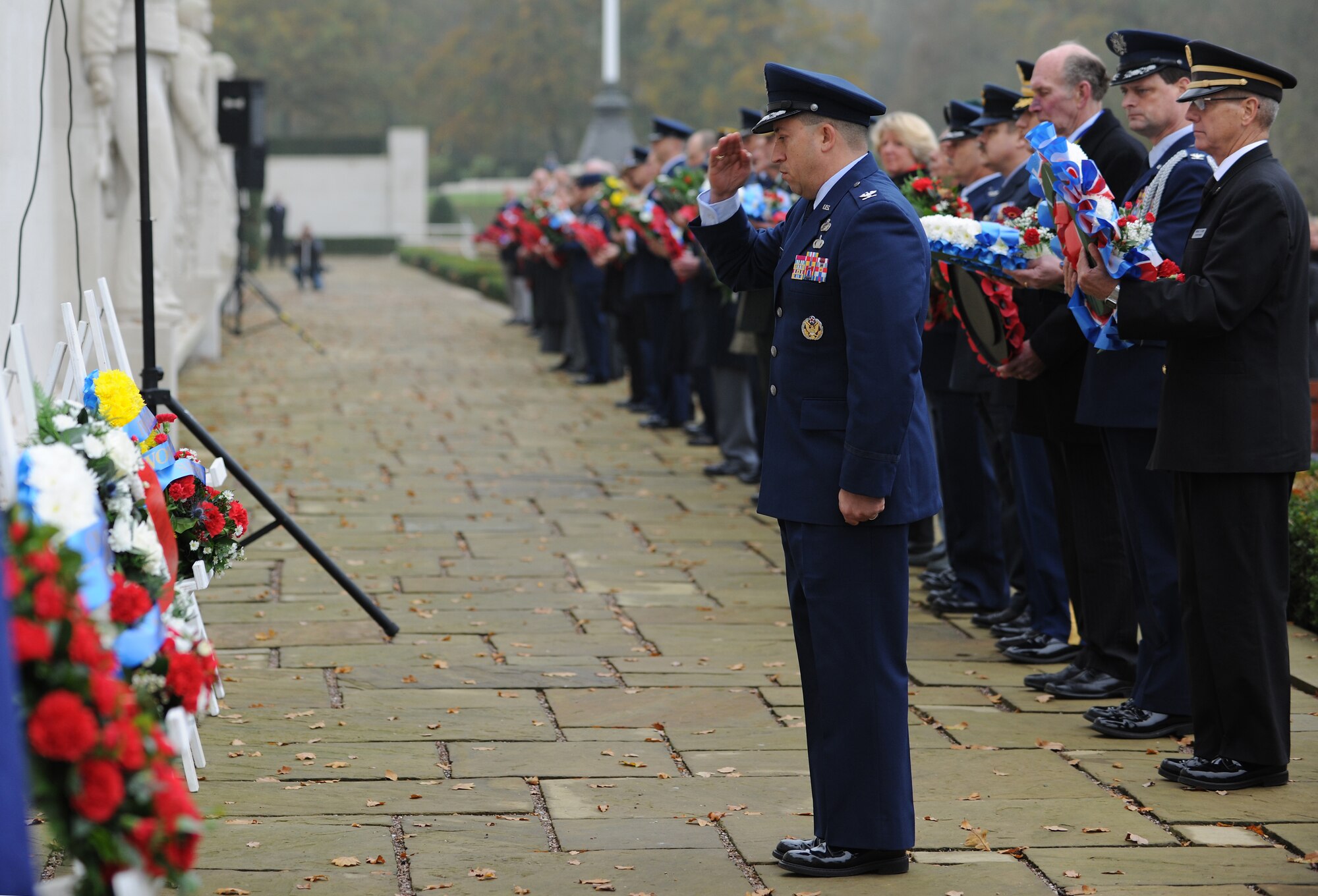 CAMBRIDGE, United Kingdom - Col. Brian Kelly, 501st Combat Support Wing commander, speaks during a ceremony at Cambridge American Cemetery and Memorial Nov. 11. More than 300 servicemembers stationed across England, veterans of both nations and those who came to honor heroes past and present participated in the event. (U.S. Air Force photo by Tech. Sgt. John Barton)