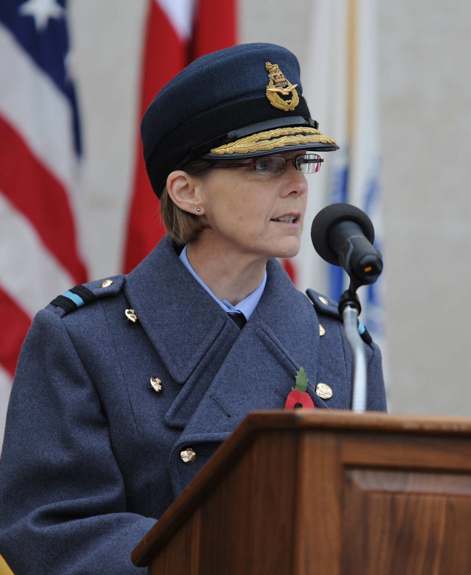 CAMBRIDGE, United Kingdom - Air Commodore Elaine West, Air Officer Assistant Chief of Staff and Air Officer Commanding Directly Administered Units, Headquarters Air Command speaks during a ceremony at Cambridge American Cemetery and Memorial Nov. 11. More than 300 servicemembers stationed across England, veterans of both nations and those who came to honor heroes past and present participated in the event. (U.S. Air Force photo by Tech. Sgt. John Barton)