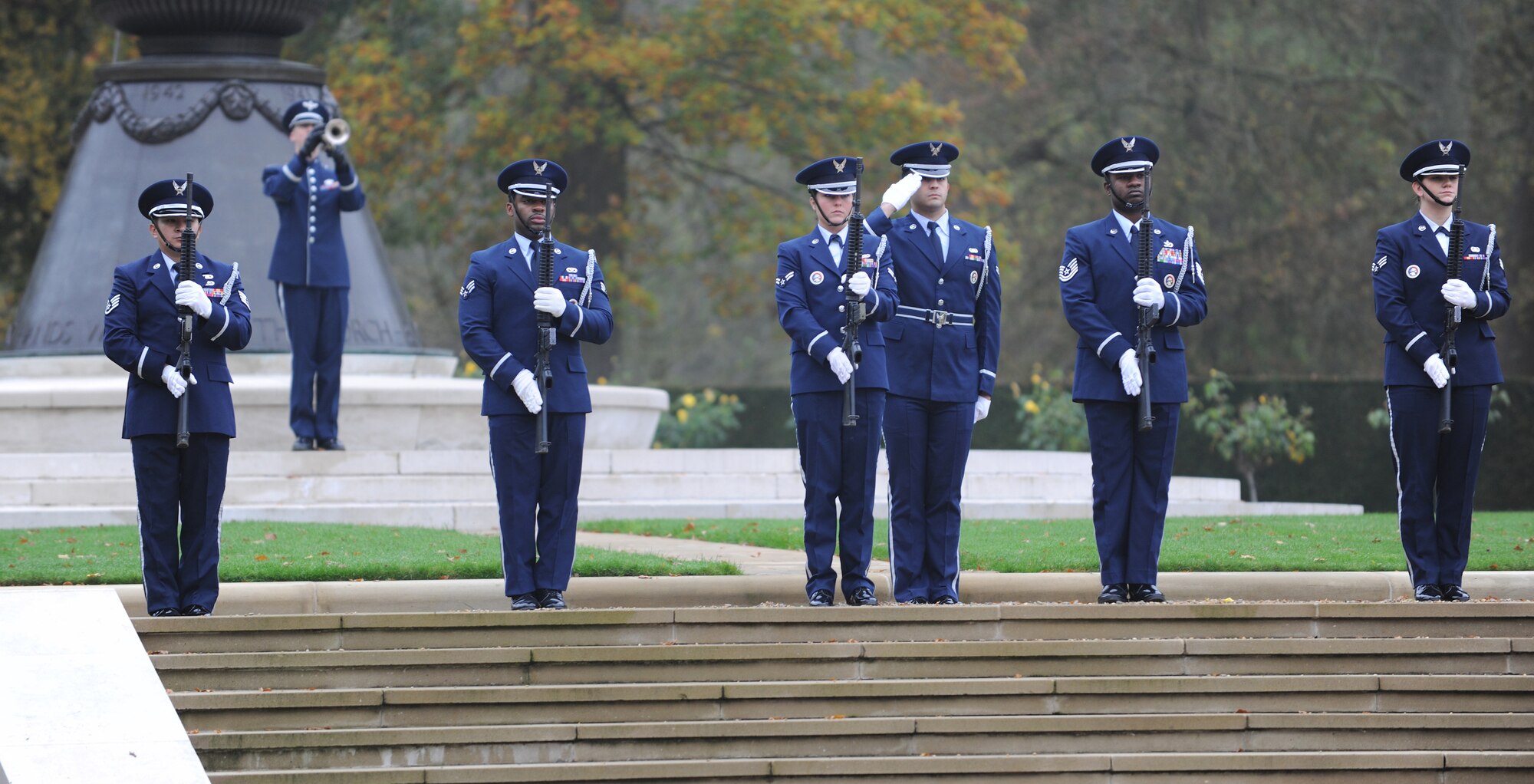 CAMBRIDGE, United Kingdom - American and British servicemembers pay tribute to veterans during a ceremony at Cambridge American Cemetery and Memorial Nov. 11. More than 300 servicemembers stationed across England, veterans of both nations and those who came to honor heroes past and present participated in the event. (U.S. Air Force photo by Tech. Sgt. John Barton)