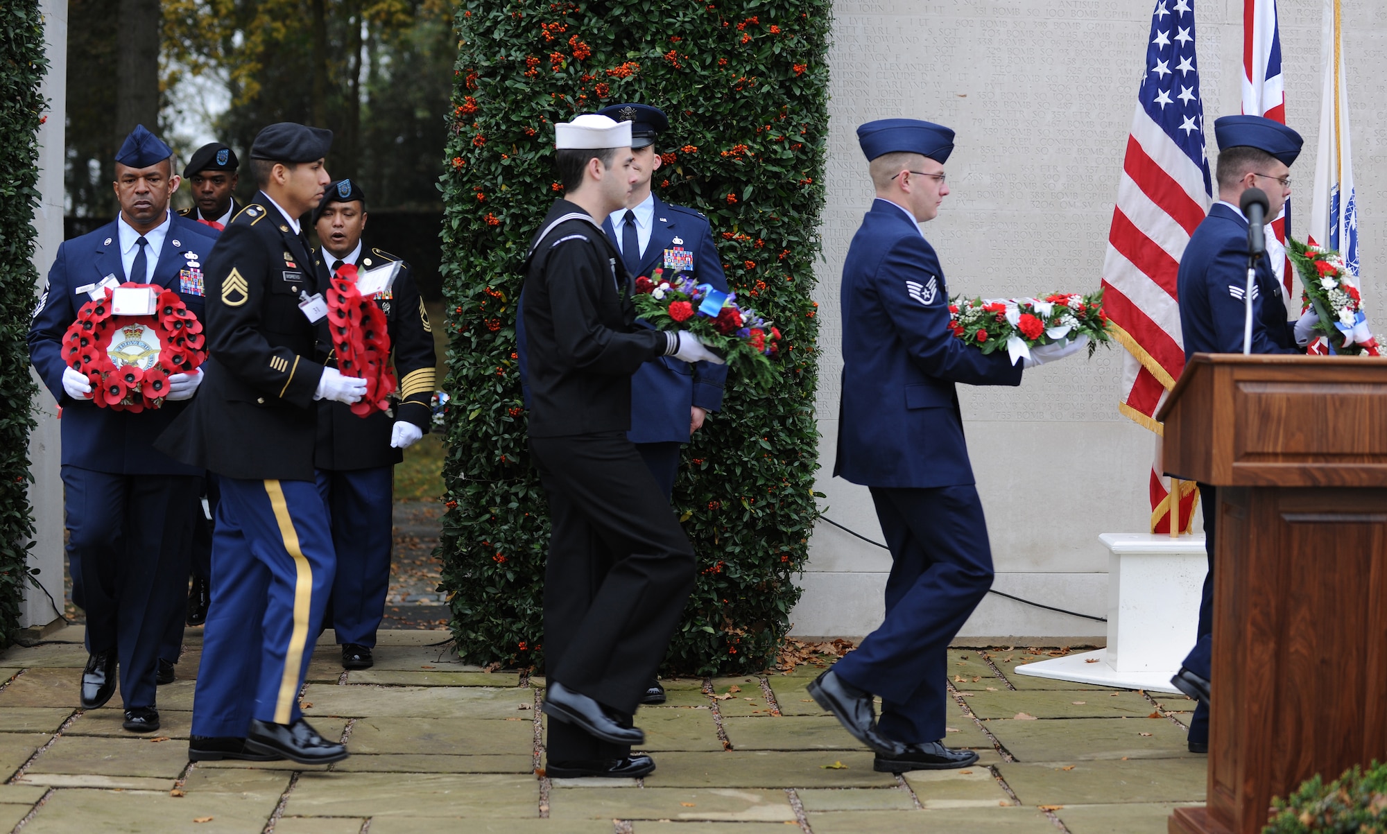 CAMBRIDGE, United Kingdom - American and British servicemembers pay tribute to veterans during a ceremony at Cambridge American Cemetery and Memorial Nov. 11. More than 300 servicemembers stationed across England, veterans of both nations and those who came to honor heroes past and present participated in the event. (U.S. Air Force photo by Tech. Sgt. John Barton)