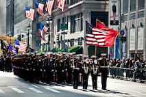 NEW YORK -- Marines from 6th Communications Battalion, Marine Forces Reserve, marched in the annual New York Veterans Day parade, here, Nov. 11. This year marks the 92st Anniversary of The New York City Veterans Day Parade. The parade is hosted by the United War Veterans Council, Inc. on behalf of the City of New York. It is the oldest and largest of its kind in the nation. Since November 11, 1919, the parade has provided an opportunity for Americans and International visitors to honor those who have served in the nation’s largest city. Sgt. Dakota Meyer, the recently awarded Marine Medal of Honor recipient, rode in the parade. Major Gen. Melvin Spiese, Deputy Commanding General, I Marine Expeditionary Force, represented the Marine Corps as one of the reviewing officials of the parade. (Marine Corps photo by Sgt. Randall A. Clinton / RELEASED)