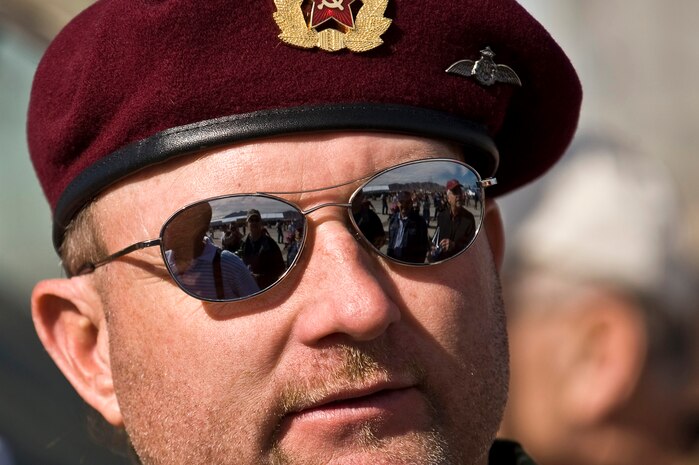 Larry Dodson, Cold War Air Museum member, talk to guests about the Russian built Mi-24 Hind Attack Helicopter during the 2011 Aviation Nation Open House Nov. 12, at Nellis Air Force Base, Nev. Aviation Nation celebrates 70 years of airpower in Las Vegas and the Air Force's accomplishments in air, space and cyberspace.  (U.S. Air Force photo by Senior Airman Brett Clashman/Released)