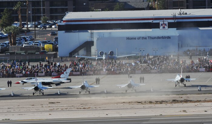 The United States Air Force Air Demonstration Squadron Thunderbirds, taxi during the 2011 Aviation Nation Open House Nov. 12, at Nellis Air Force Base, Nev. The Nellis Open House is an opportunity for the Las Vegas community to view aerial demonstrations and static displays of various aircraft from the military. The open house also acts as the final air show of the year for the Thunderbirds. (U.S. Air Force photo by Senior Master Sgt.  Kevin Gruenwald/Released)


(U.S. Air Force photo by Senior Master Sgt.  Kevin Gruenwald/Released)

