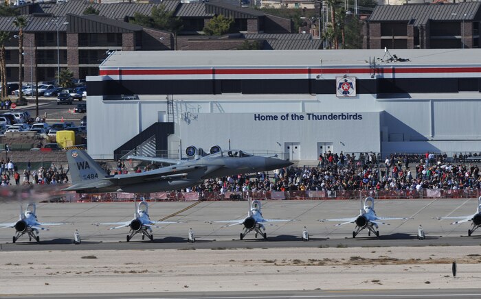 An F-15 Eagle, United States Air Force Weapons School, performs a high speed pass during the 2011 Aviation Nation Open House Nov. 12, at Nellis Air Force Base, Nev. The Nellis Open House is an opportunity for the Las Vegas community to view aerial demonstrations and static displays of various aircraft from the military. The open house also acts as the final air show of the year for the U.S. Air Force Aerial Demonstration Squadron Thunderbirds. (U.S. Air Force photo by Senior Master Sgt.  Kevin Gruenwald/Released)






