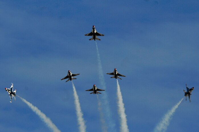 The United States Air Force Air Demonstration Squadron Thunderbirds, perform a Delta manuever during the 2011 Aviation Nation Open House Nov. 12th, at Nellis Air Force Base, Nev. The Nellis Open House is an opportunity for the Las Vegas community to view aerial demonstrations and static displays of various aircraft from the military. (U.S. Air Force photo by Senior Master Sgt.  Kevin Gruenwald/Released)

