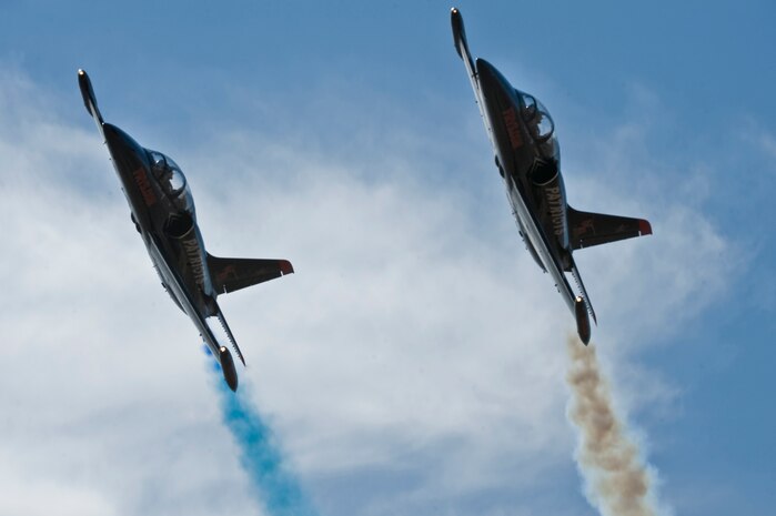 Two L-39 Jets, Patriots Jet Demonstration Team, perform maneuvers over the flight line during the 2011 Aviation Nation Open House Nov. 12, at Nellis Air Force Base, Nev.  Aviation Nation celebrates 70 years of airpower in Las Vegas and the Air Force's accomplishments in air, space and cyberspace. (U.S. Air Force photo by Airman 1st Class Daniel Hughes/Released)
