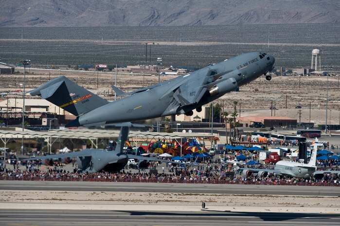 A U.S. Air Force C-17 Globemaster III, March Air Reserve Base, Ca., takes off during the 2011 Aviation Nation Open House Nov,12, at Nellis Air Force Base, Nev.  Aviation Nation celebrates 70 years of airpower in Las Vegas and the Air Force's accomplishments in air, space and cyberspace. (U.S. Air Force photo by Airman 1st Class Daniel Hughes/Released)